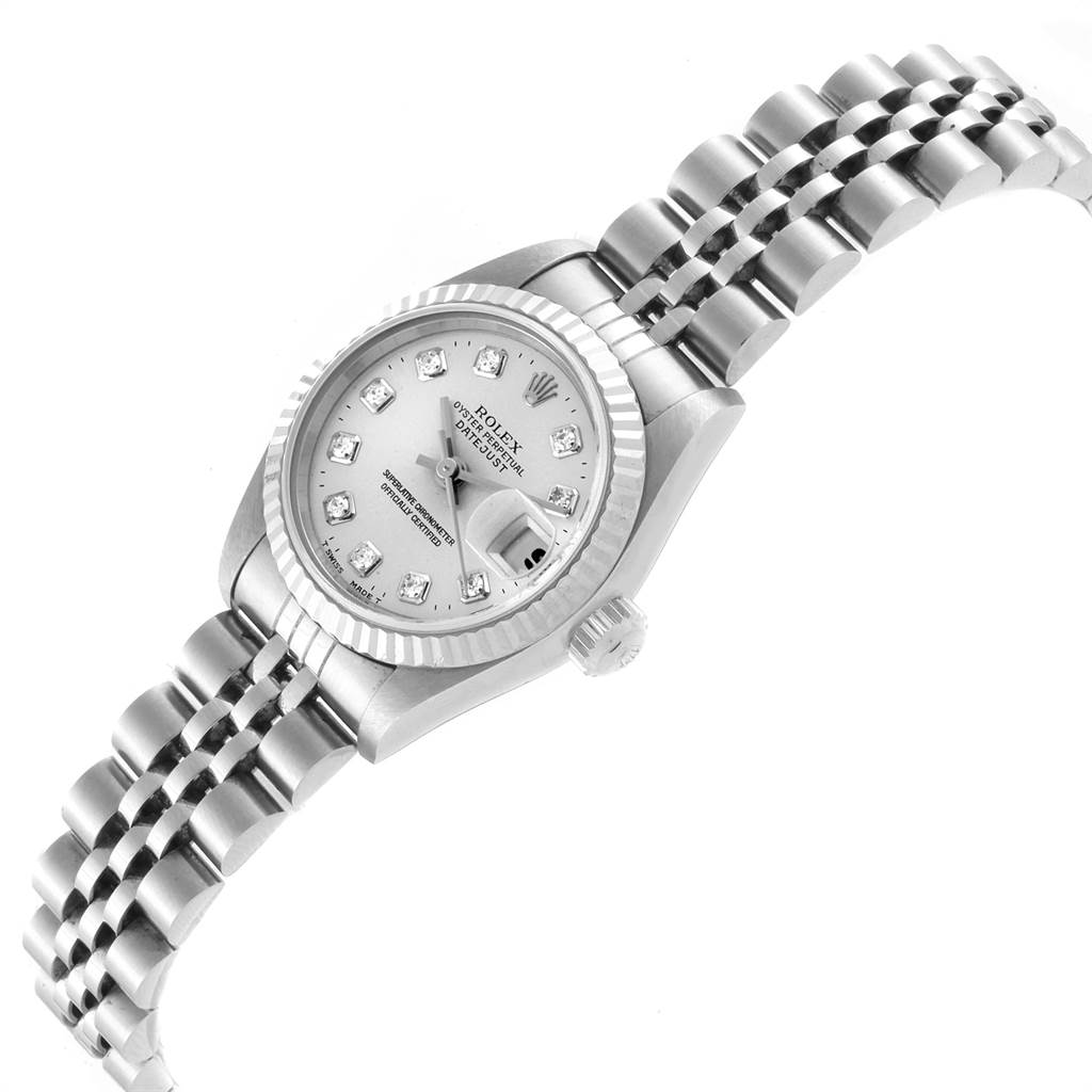 The image shows a Rolex Datejust 69174 Women's Stainless Steel Silver Dial 69174 Women's Stainless Steel Silver Dial watch at a tilted angle, highlighting its dial, bezel, and bracelet.
