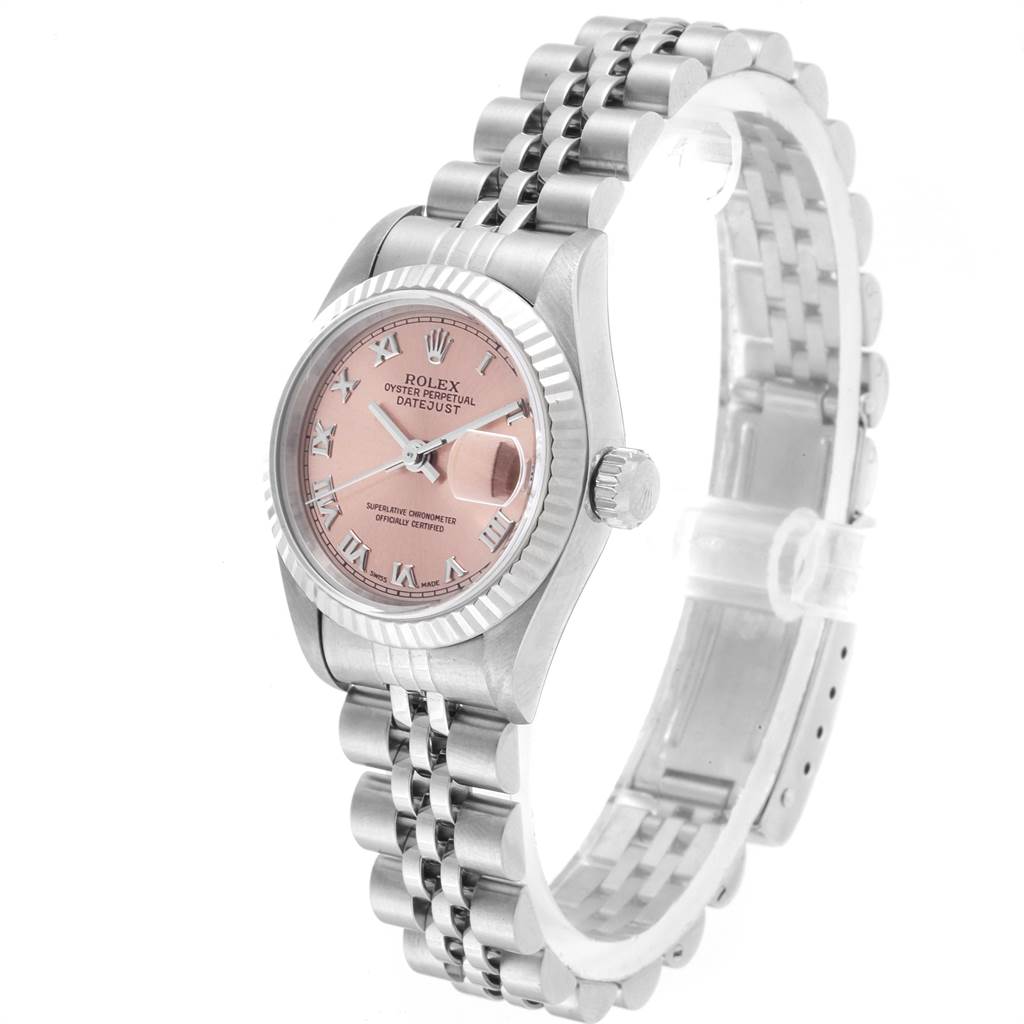 The image shows a side view of a Rolex Datejust 69174 Women's Stainless Steel Pink Dial 69174 Women's Stainless Steel Pink Dial watch with a pink dial and fluted bezel, highlighting its Jubilee bracelet.