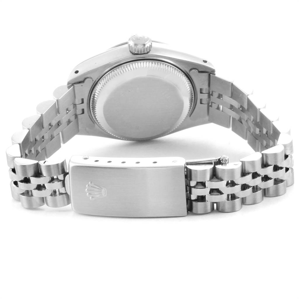 The image shows the backside of a Rolex Datejust 69174 Women
s Stainless Steel White Dial 69174 Women
s Stainless Steel White Dial watch, featuring the case back, crown, and Jubilee bracelet with the clasp.