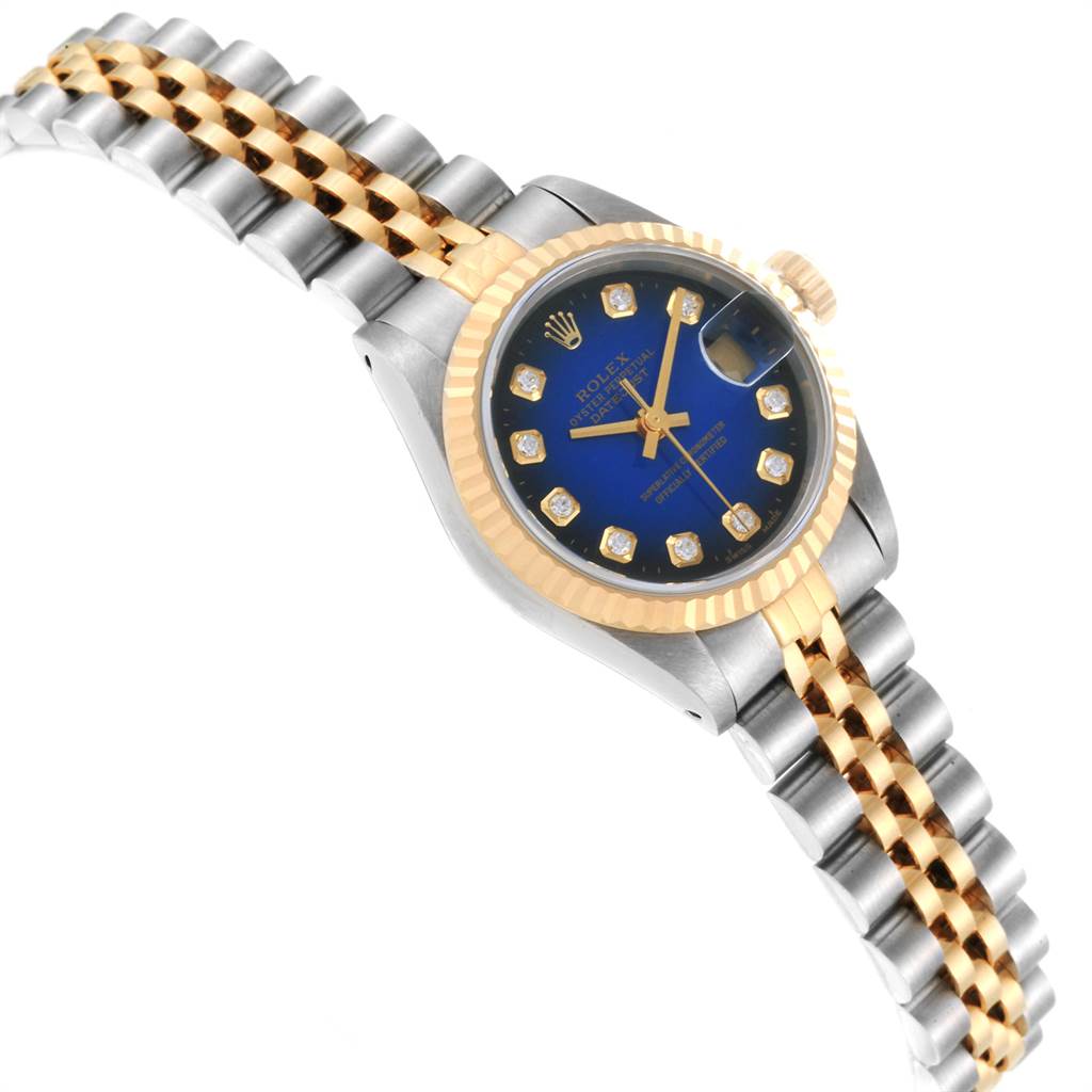 This Rolex Datejust 69173 Women's Steel and Gold (two tone) Blue Dial 69173 Women's Steel and Gold (two tone) Blue Dial watch is shown from a top-down angle, highlighting the dial, bezel, case, and bracelet.