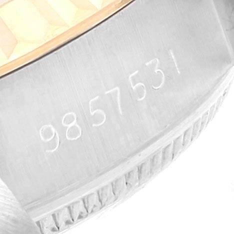 This image shows a close-up of the serial number on the case of a Rolex Datejust 69173 Women's Steel and Gold (two tone) Blue Dial 69173 Women's Steel and Gold (two tone) Blue Dial watch.