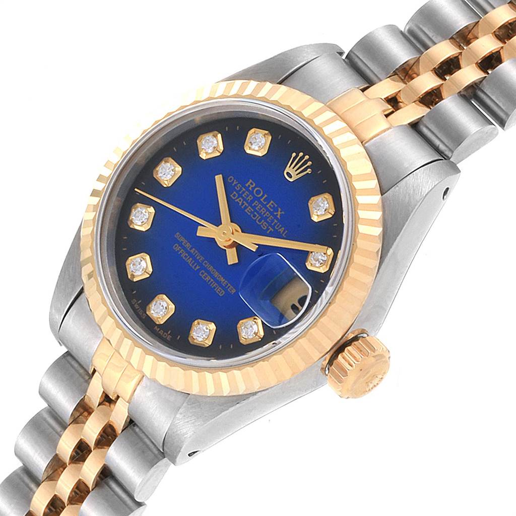 This is a close-up of the Rolex Datejust 69173 Women's Steel and Gold (two tone) Blue Dial 69173 Women's Steel and Gold (two tone) Blue Dial watch showing the dial, bezel, crown, and part of the bracelet.