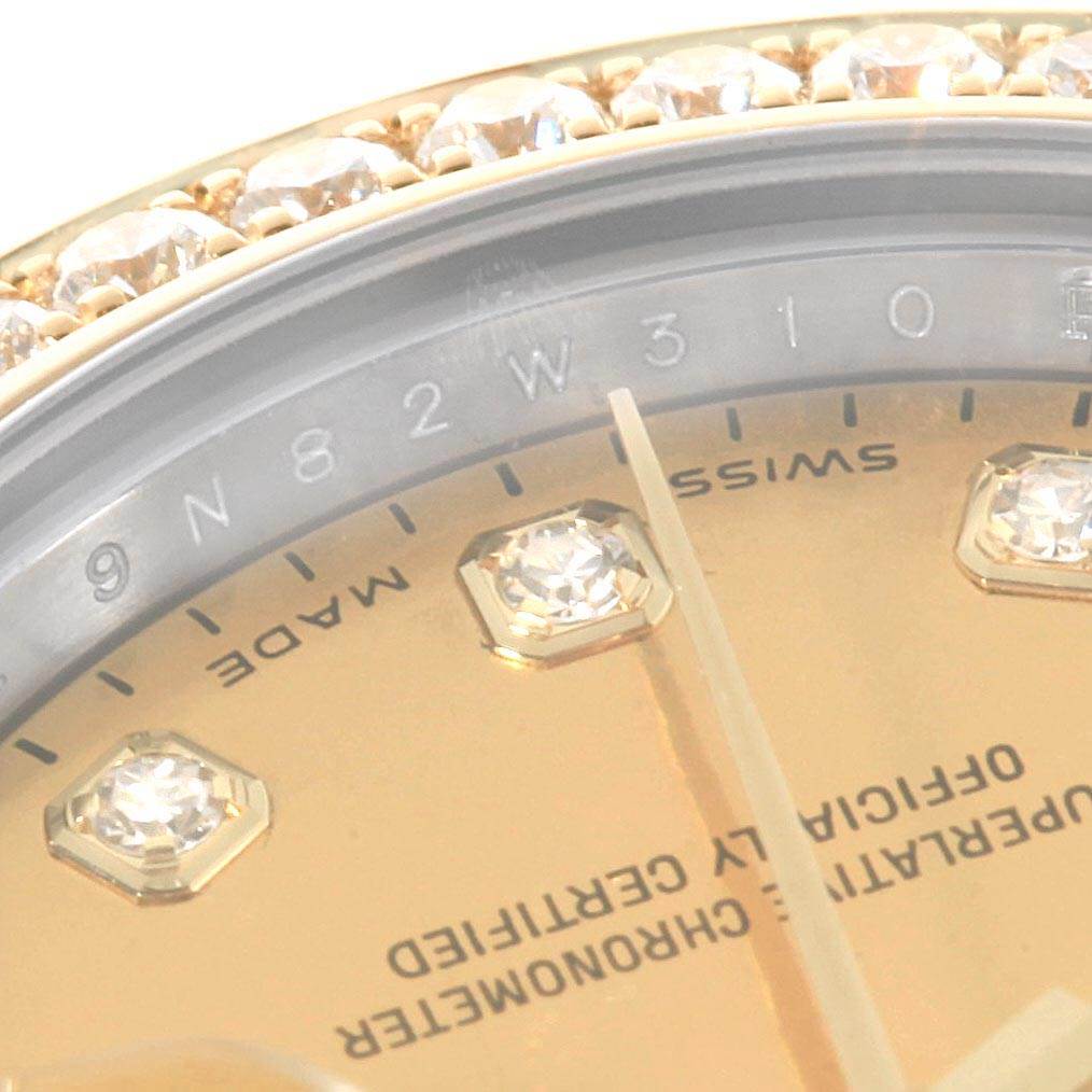 This close-up image of a Datejust model by Rolex shows part of the gold dial, diamonds, and part of the bezel.