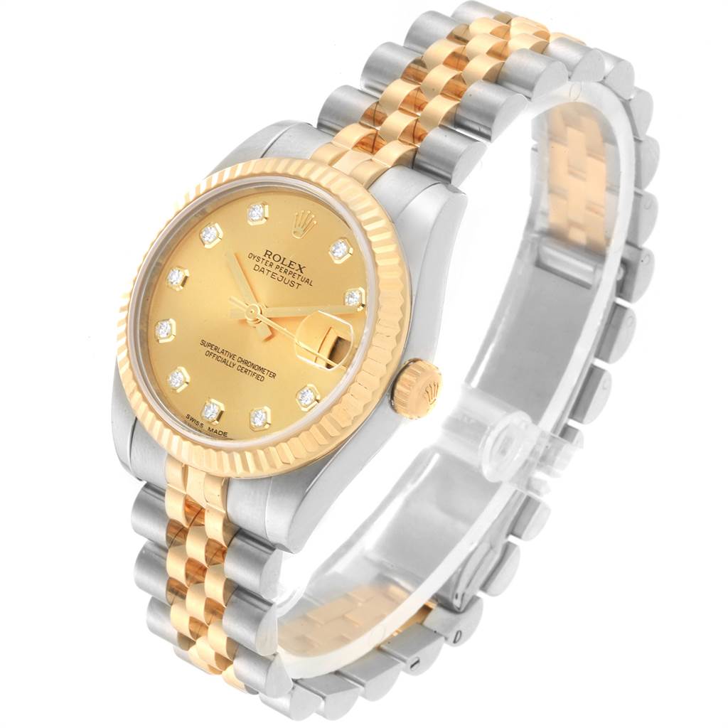 This image shows a Rolex Datejust 178273 Women
s Steel and Gold (two tone) Champagne Dial 178273 Women
s Steel and Gold (two tone) Champagne Dial watch at a three-quarter angle, displaying its gold and silver bracelet, bezel, and dial.