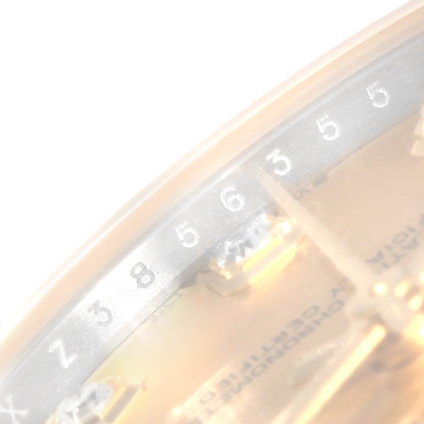 This image shows a close-up view of the date wheel and partially the dial of a Rolex Datejust 178273 Women
s Steel and Gold (two tone) Champagne Dial 178273 Women
s Steel and Gold (two tone) Champagne Dial watch.