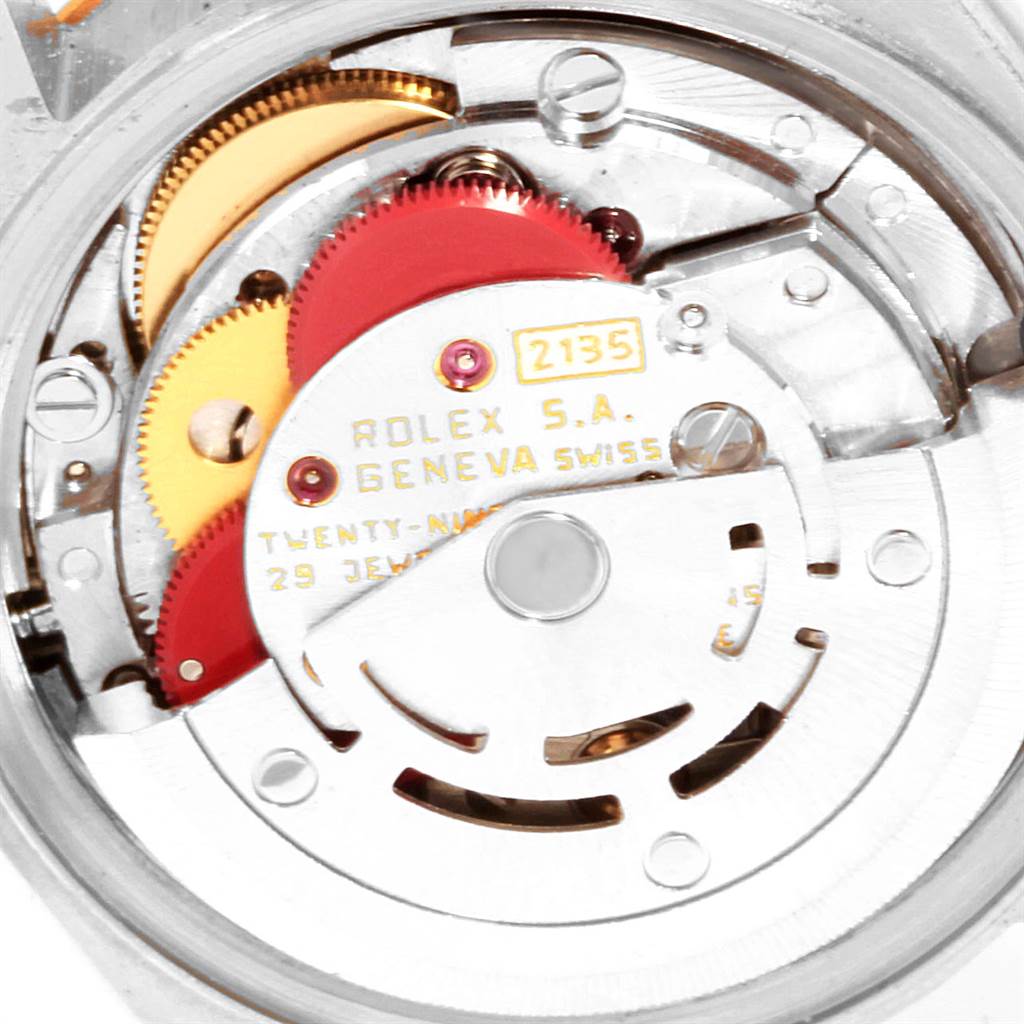 This image shows the internal mechanism of a Rolex Datejust 69173 Women's Stainless Steel White Dial 69173 Women's Stainless Steel White Dial watch, highlighting gears and movement parts.