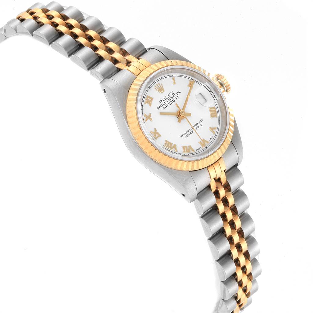 This image shows the Rolex Datejust 69173 Women's Stainless Steel White Dial 69173 Women's Stainless Steel White Dial watch from an angled perspective, highlighting the face, bezel, and two-tone jubilee bracelet.