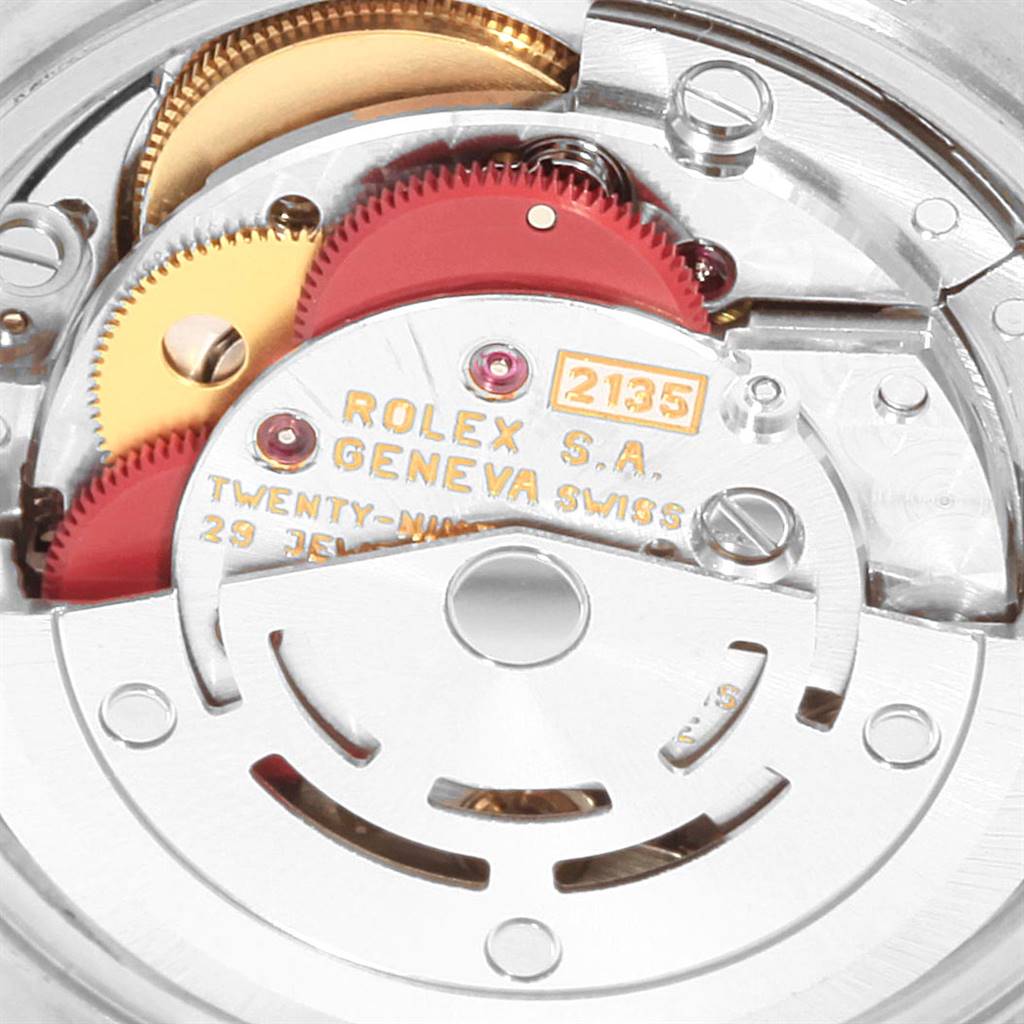 This image shows the internal mechanism and parts of a Rolex Datejust 69163 Women's Stainless Steel Grey Dial 69163 Women's Stainless Steel Grey Dial watch, focusing on the gears and movement.