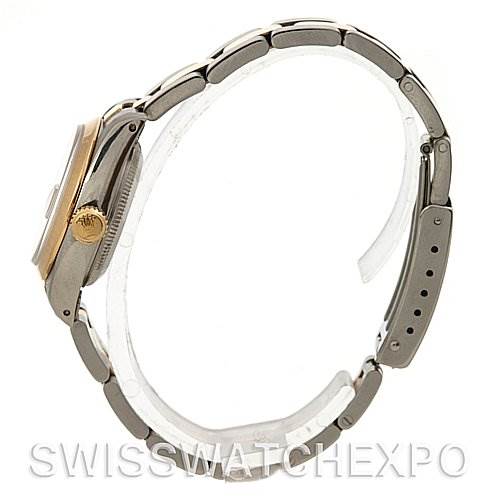 The image shows a side view of a Rolex Datejust 69163 Women's Stainless Steel Mother of Pearl Dial 69163 Women's Stainless Steel Mother of Pearl Dial watch, highlighting the crown, case, and part of the bracelet.