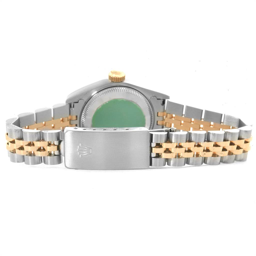 The image shows the back case and clasp of a Rolex Datejust 69173 Women's Stainless Steel Beige Dial 69173 Women's Stainless Steel Beige Dial watch with a two-tone metal bracelet.