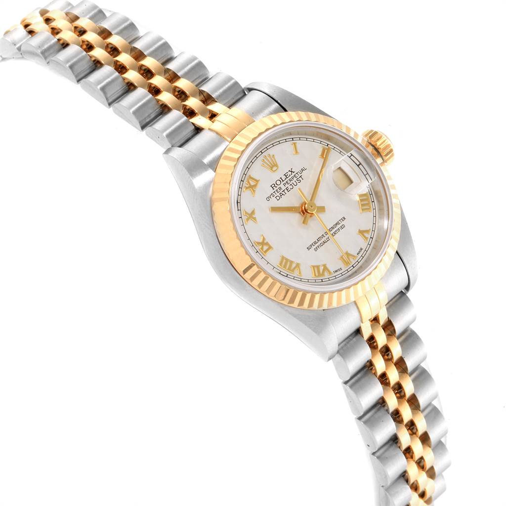 The image shows a Rolex Datejust 69173 Women's Stainless Steel Beige Dial 69173 Women's Stainless Steel Beige Dial watch angled from the top, featuring its dial, bezel, crown, and bracelet.