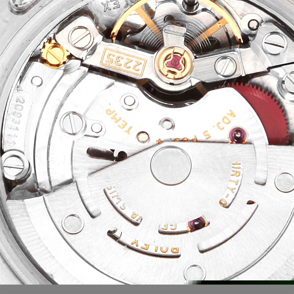 The image shows the intricate internal mechanism of a Rolex Datejust 179174 Women
s Stainless Steel White Dial 179174 Women
s Stainless Steel White Dial watch, focusing on the movement components.
