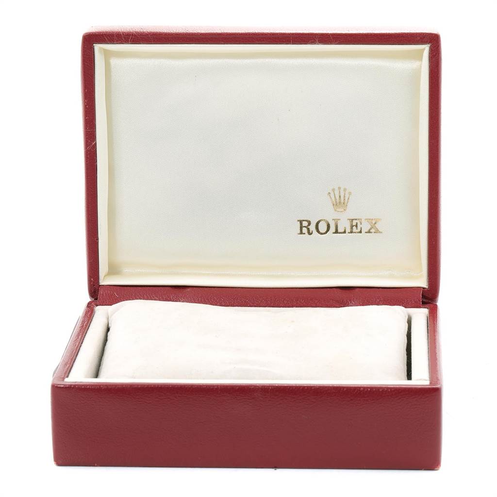 This image shows an open Rolex watch box, likely for a Datejust model, with a cushion inside.