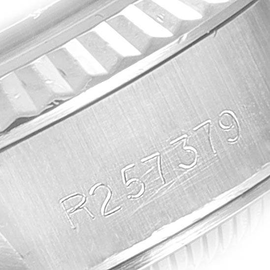 This image shows a close-up of the case and engravings of a Rolex Datejust 69174 Women
s Stainless Steel Silver Dial 69174 Women
s Stainless Steel Silver Dial model watch.