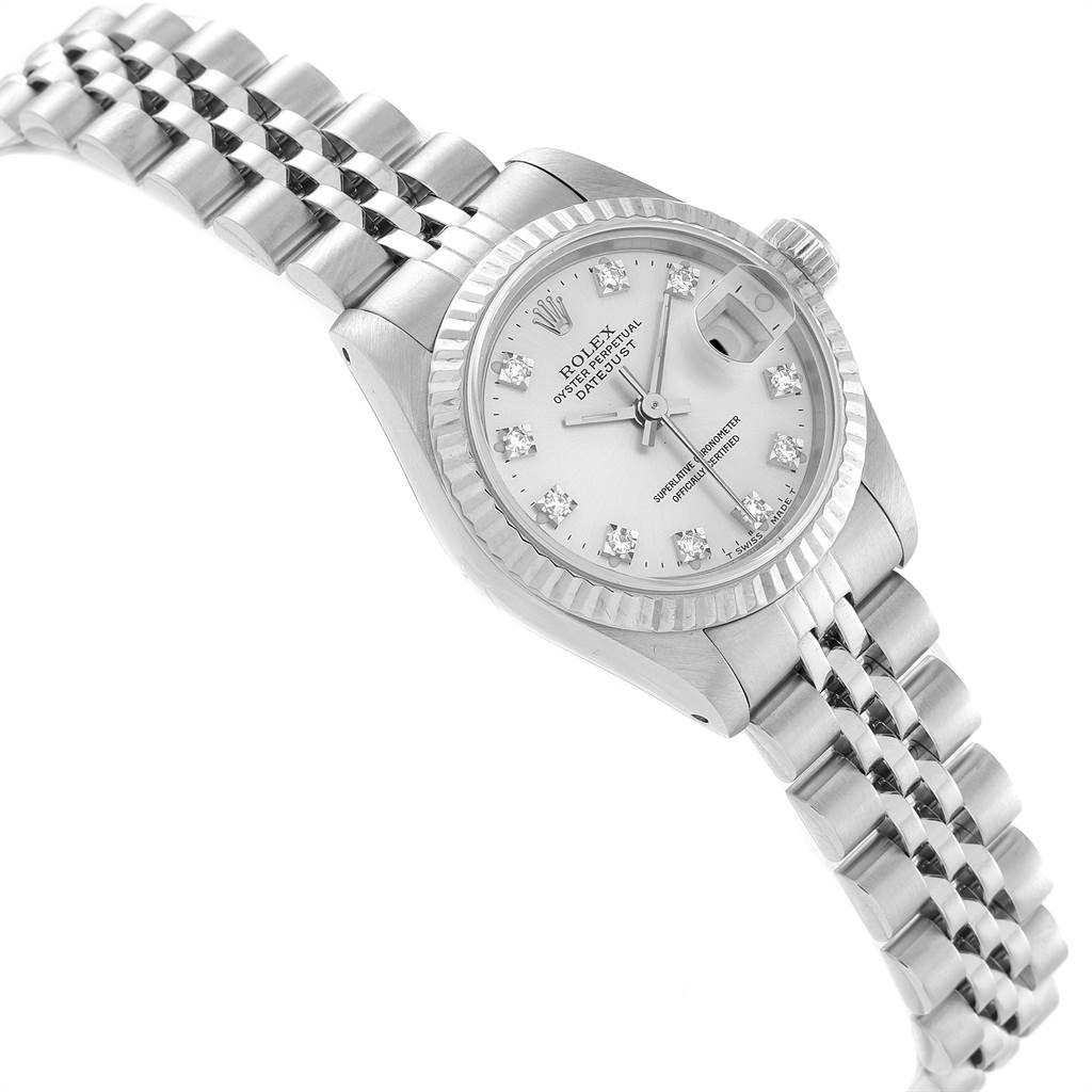 The image displays a Rolex Datejust 69174 Women
s Stainless Steel Silver Dial 69174 Women
s Stainless Steel Silver Dial model watch from an angled top view, highlighting the face, bracelet, and crown.
