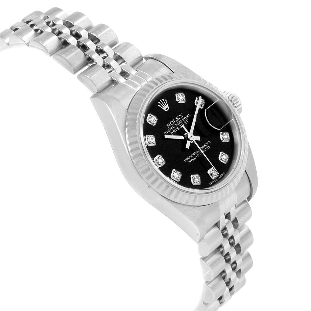 The image shows a side view of a Rolex Datejust 79174 Women
s Stainless Steel Black Dial 79174 Women
s Stainless Steel Black Dial watch, highlighting the black dial, fluted bezel, and jubilee bracelet.