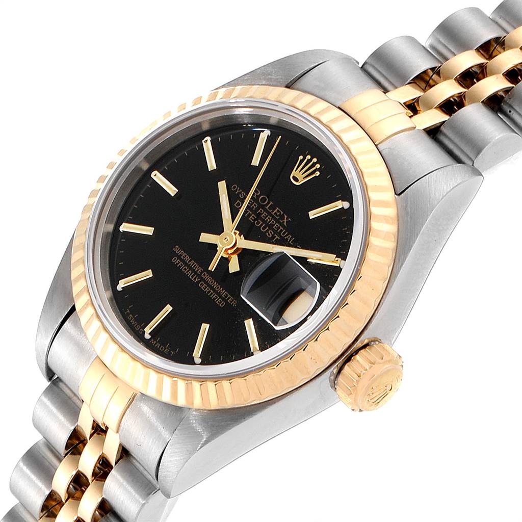 The Rolex Datejust 69173 Women
s Stainless Steel Black Dial 69173 Women
s Stainless Steel Black Dial watch is shown from an angled view highlighting its bezel, dial, crown, and two-tone Jubilee bracelet.