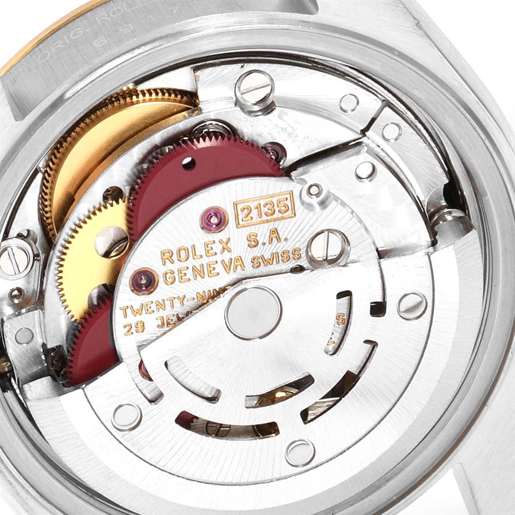 This image shows a close-up view of the Rolex Datejust 69173 Women
s Stainless Steel Black Dial 69173 Women
s Stainless Steel Black Dial movement mechanism from the back.