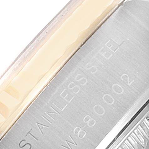 This close-up image shows the side view of the bezel and case of a Rolex Datejust 69173 Women
s Stainless Steel Black Dial 69173 Women
s Stainless Steel Black Dial, highlighting the "STAINLESS STEEL" engraving.