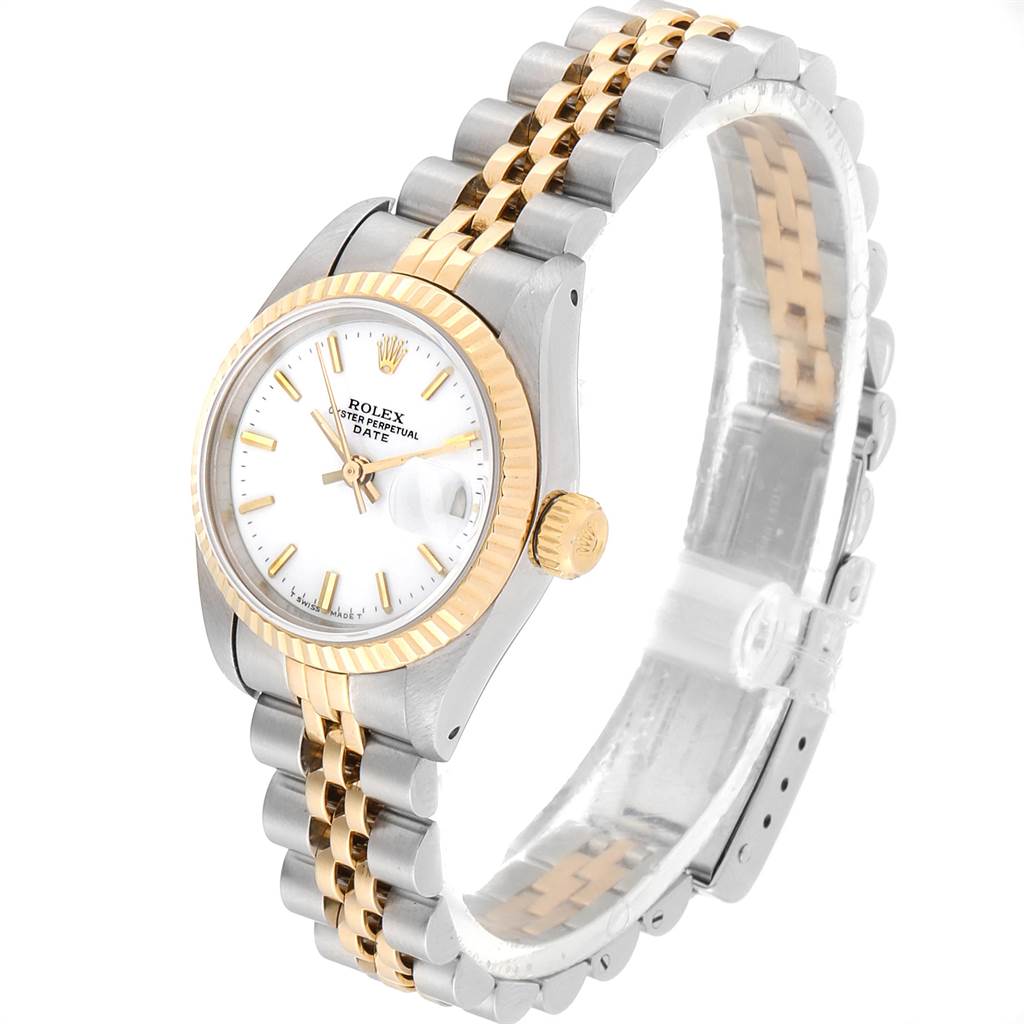 The image shows a Rolex Datejust 69173 Women's Stainless Steel White Dial 69173 Women's Stainless Steel White Dial watch angled to display the face, fluted bezel, and jubilee bracelet.