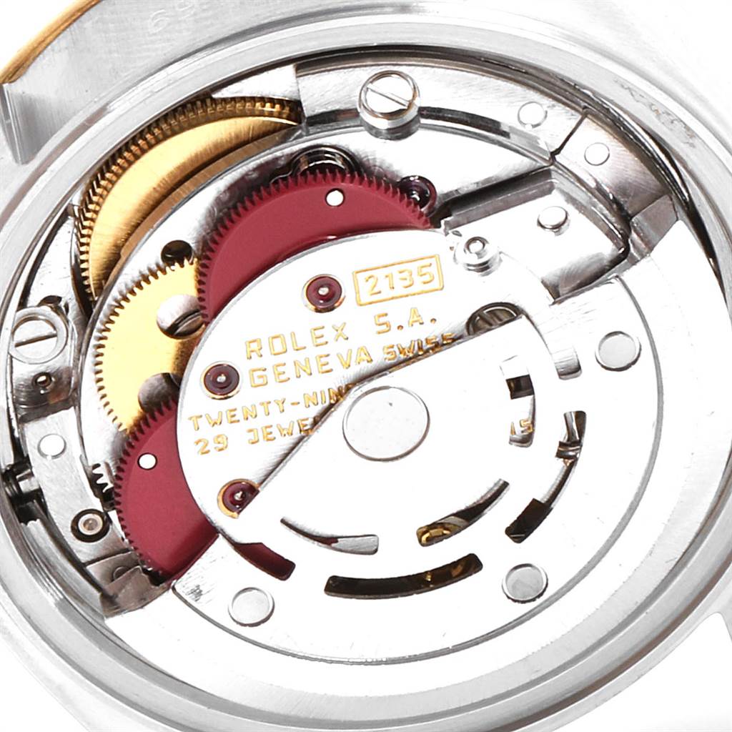 This image shows a close-up view of the internal movement parts of a Rolex Datejust 69173 Women's Stainless Steel White Dial 69173 Women's Stainless Steel White Dial watch model.