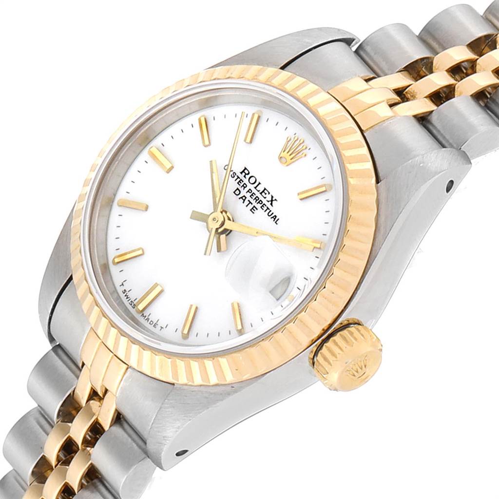 The image shows a close-up, angled view of a Rolex Datejust 69173 Women's Stainless Steel White Dial 69173 Women's Stainless Steel White Dial watch, highlighting the face, bezel, crown, and part of the bracelet.