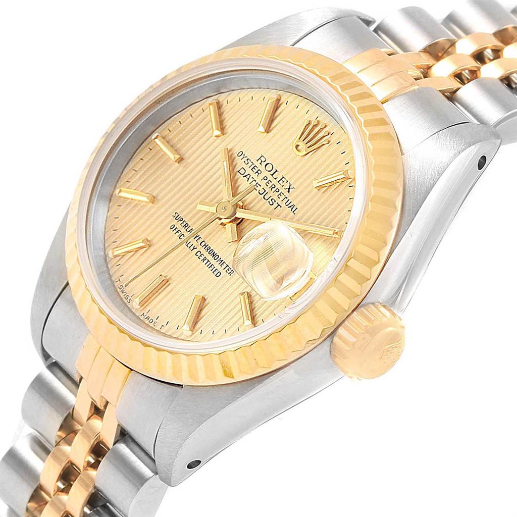 The image shows a close-up angled view of the Rolex Datejust 69173 Women's Stainless Steel Champagne Dial 69173 Women's Stainless Steel Champagne Dial model, highlighting the dial, crown, and part of the bracelet.