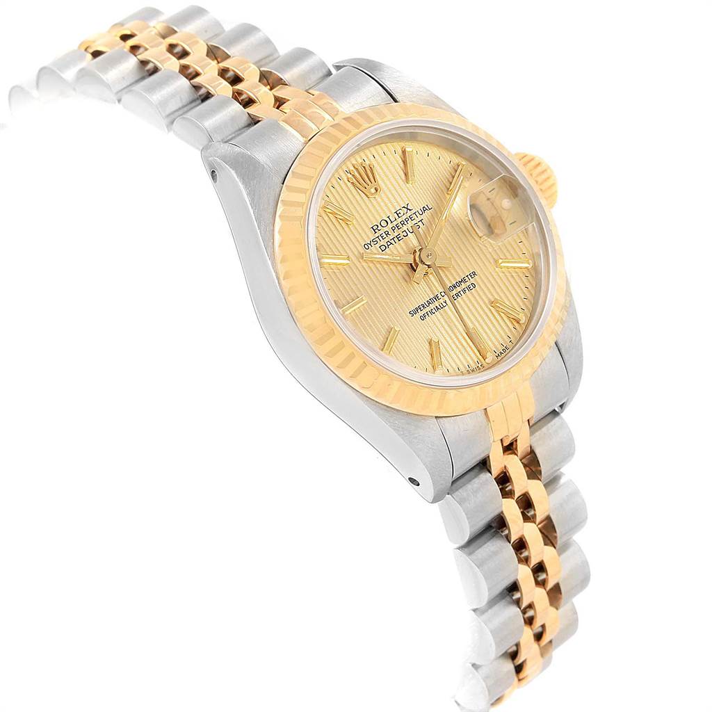 This Rolex Datejust 69173 Women's Stainless Steel Champagne Dial 69173 Women's Stainless Steel Champagne Dial model watch is shown from an angled side view, highlighting its face, bezel, crown, and bracelet.