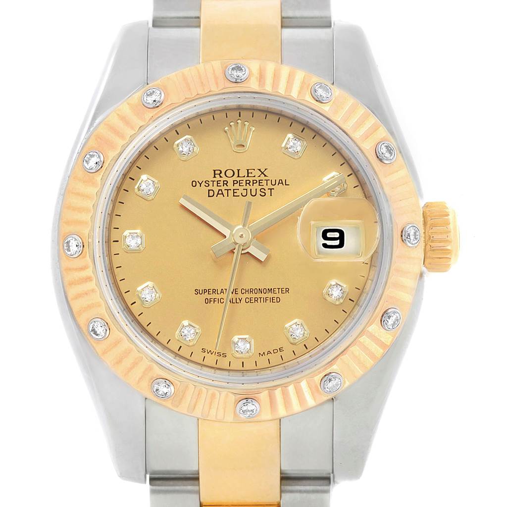 The image shows a frontal view of the Rolex Datejust 179313 Women's Stainless Steel Champagne Dial 179313 Women's Stainless Steel Champagne Dial watch, highlighting its gold dial, bezel, and part of the two-tone bracelet.