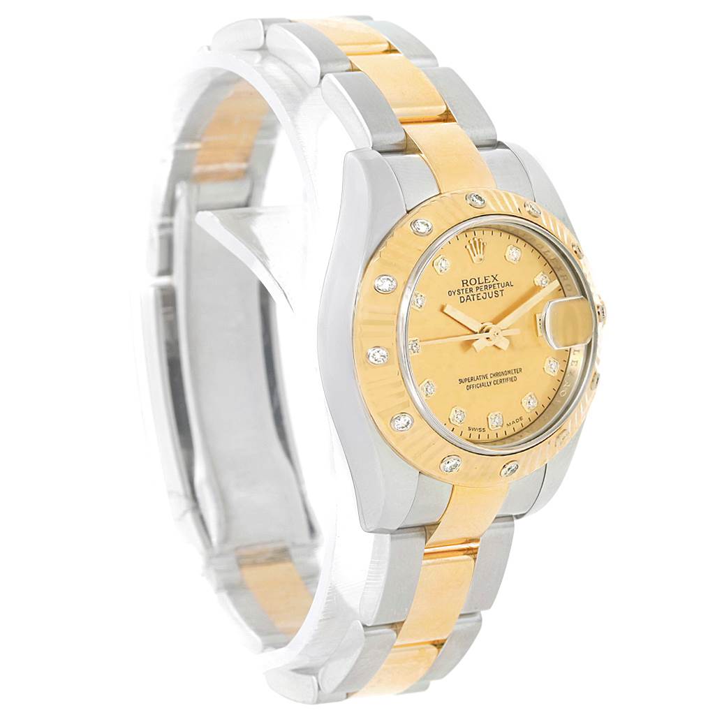 This image shows a Rolex Datejust 179313 Women's Stainless Steel Champagne Dial 179313 Women's Stainless Steel Champagne Dial watch at a side angle, highlighting its gold and silver bracelet and diamond-studded bezel and dial.