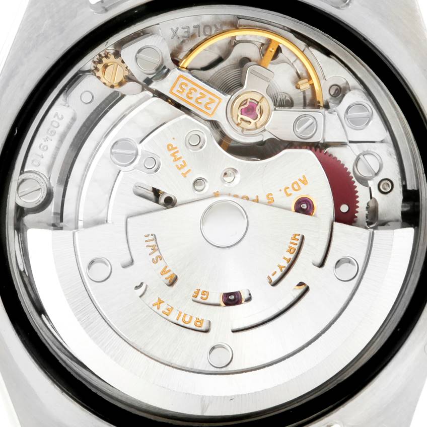 The image shows a close-up view of the movement mechanism inside a Rolex Datejust 179173 Women's Steel and Gold (two tone) White Dial 179173 Women's Steel and Gold (two tone) White Dial watch.