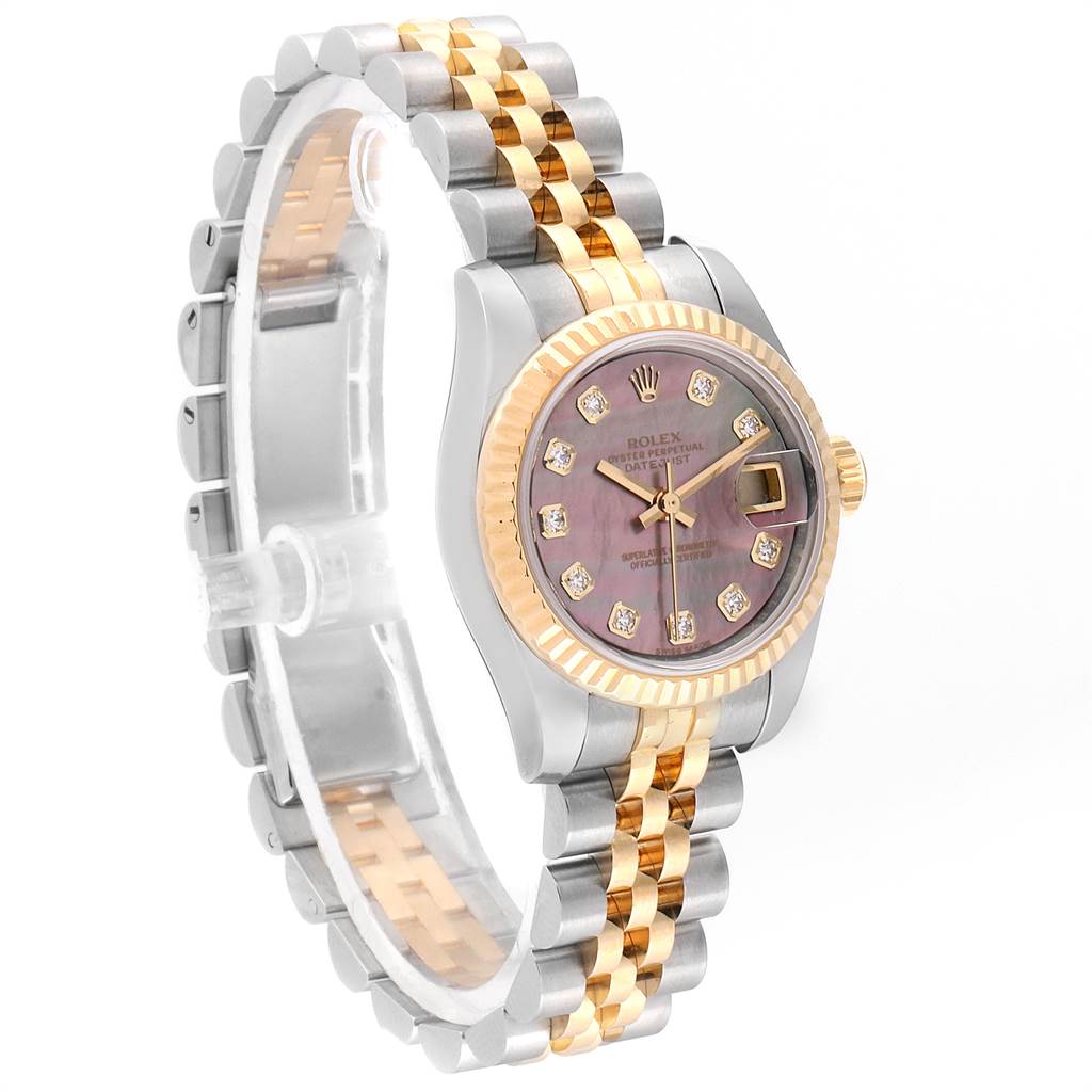 This Rolex Datejust 179173 Women's Steel and Gold (two tone) Mother of Pearl Dial 179173 Women's Steel and Gold (two tone) Mother of Pearl Dial watch is shown at an angle displaying the face, bracelet, and crown, highlighting its two-tone design.