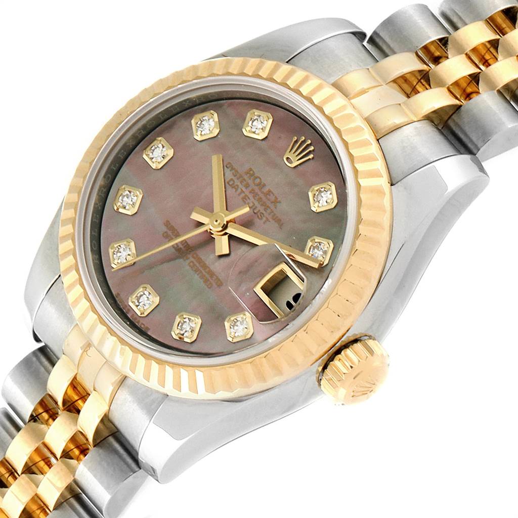 The image shows a close-up of the dial, bezel, and partially the bracelet of a Rolex Datejust 179173 Women's Steel and Gold (two tone) Mother of Pearl Dial 179173 Women's Steel and Gold (two tone) Mother of Pearl Dial watch, highlighting its gold and silver tones.
