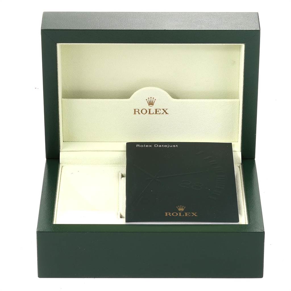 Shown in the image is a Rolex Datejust 179173 Women's Steel and Gold (two tone) Mother of Pearl Dial 179173 Women's Steel and Gold (two tone) Mother of Pearl Dial box with its interior visible, including a booklet and empty slots for the watch and accessories.