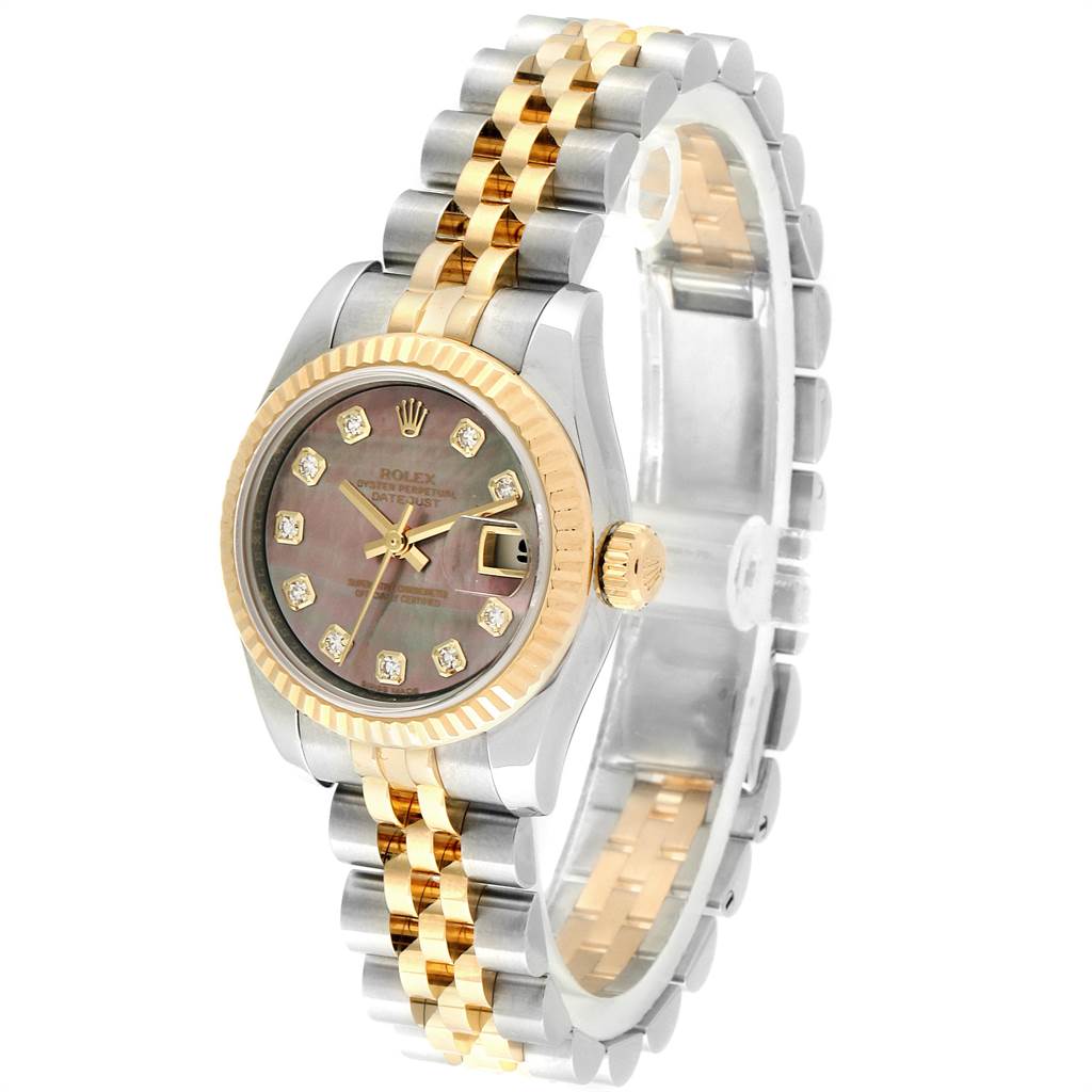 The image shows a Rolex Datejust 179173 Women's Steel and Gold (two tone) Mother of Pearl Dial 179173 Women's Steel and Gold (two tone) Mother of Pearl Dial watch at a three-quarter angle, highlighting its bezel, crown, face, and two-tone bracelet.