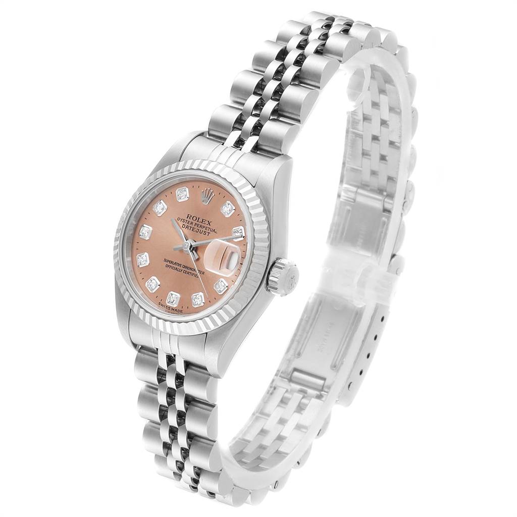 This image shows a Rolex Datejust 79174 Women
s Stainless Steel Pink Dial 79174 Women
s Stainless Steel Pink Dial watch from a slight side angle, displaying the face, bezel, crown, and bracelet.