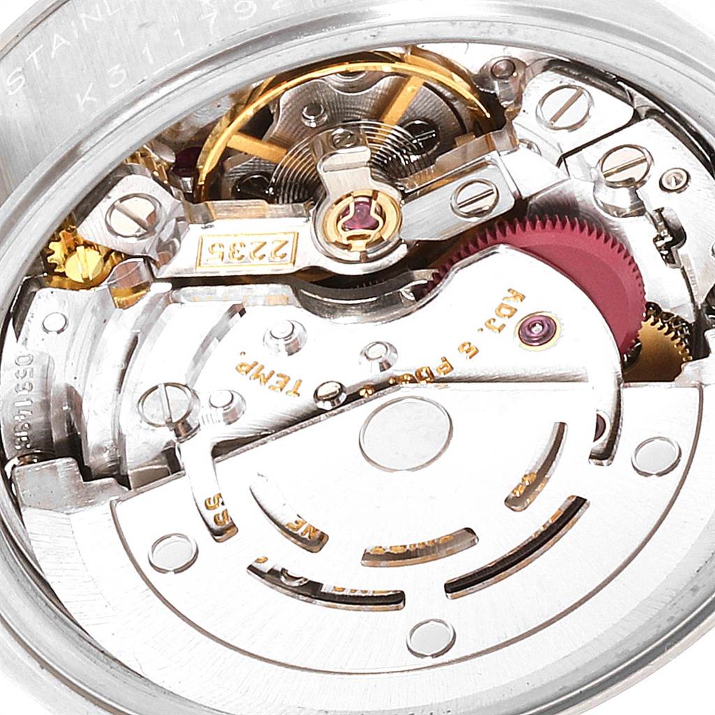 This image shows a close-up view of the inner mechanical movement of a Rolex Datejust 79174 Women
s Stainless Steel Pink Dial 79174 Women
s Stainless Steel Pink Dial watch.