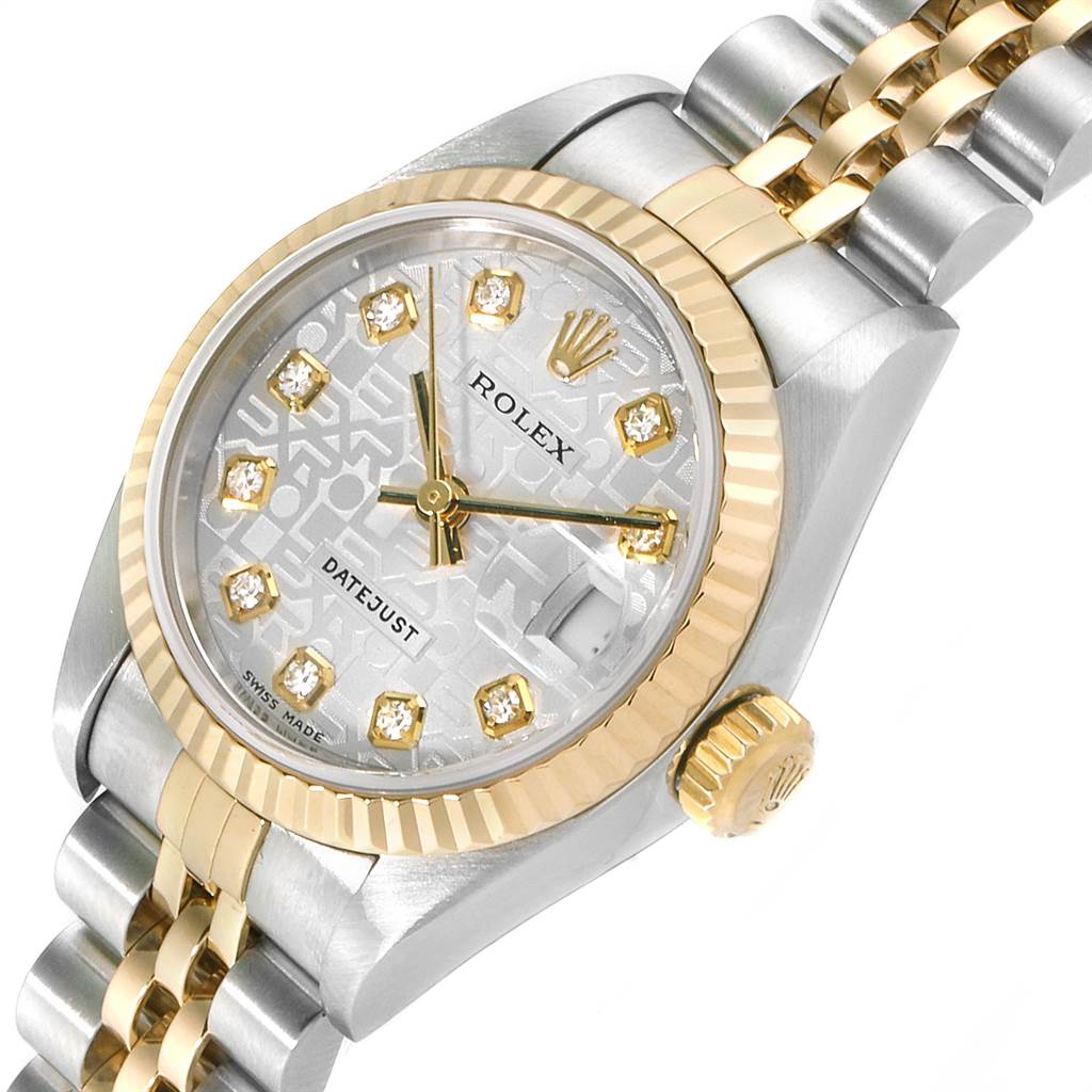 This image shows a Rolex Datejust 79173 Women's Stainless Steel Silver Dial 79173 Women's Stainless Steel Silver Dial watch at an angled view, highlighting its face, bezel, and part of the bracelet.