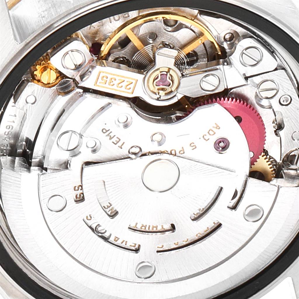 This close-up image shows the intricate details of the movement inside a Rolex Datejust 79173 Women's Stainless Steel Silver Dial 79173 Women's Stainless Steel Silver Dial watch, including gears and components.