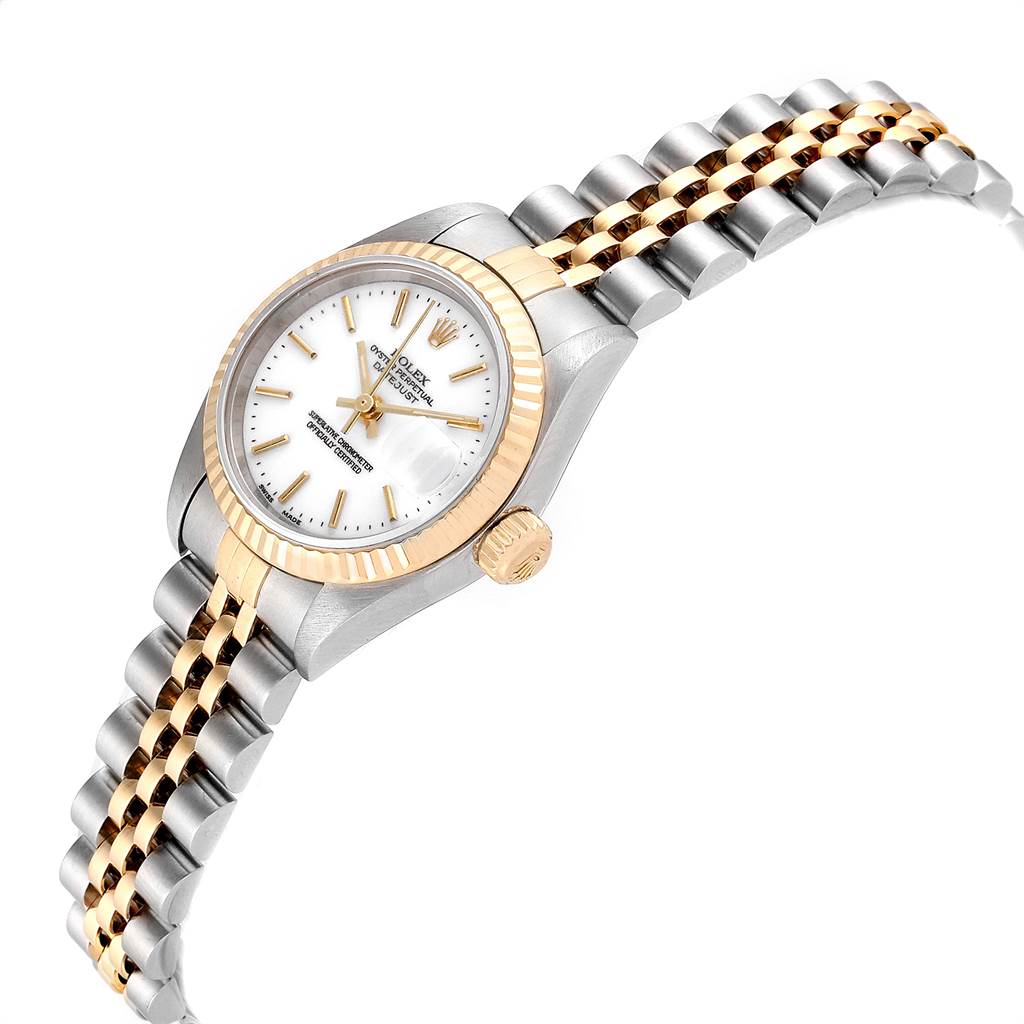 The Rolex Datejust 79173 Women
s Steel and Gold (two tone) White Dial 79173 Women
s Steel and Gold (two tone) White Dial watch is shown at a three-quarter angle, displaying the dial, bezel, crown, and part of the bracelet.