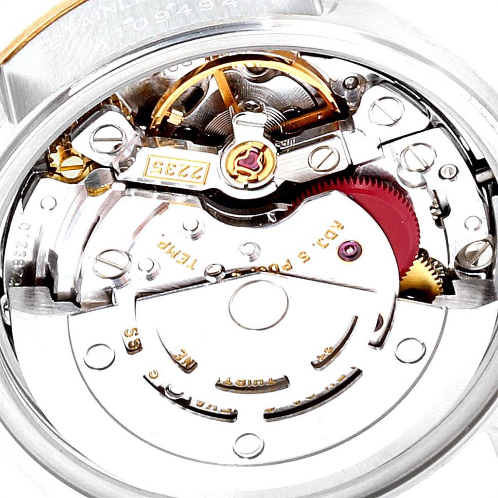 This image shows the intricate inner movement of a Rolex Datejust 79163 Women's Steel and Gold (two tone) Silver Dial 79163 Women's Steel and Gold (two tone) Silver Dial watch from a close-up, back angle.