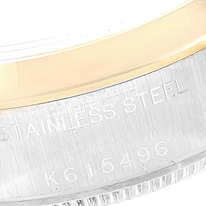 This image shows a close-up of the casing with "Stainless Steel" markings on the Rolex Datejust 79163 Women's Steel and Gold (two tone) Grey Dial 79163 Women's Steel and Gold (two tone) Grey Dial watch.