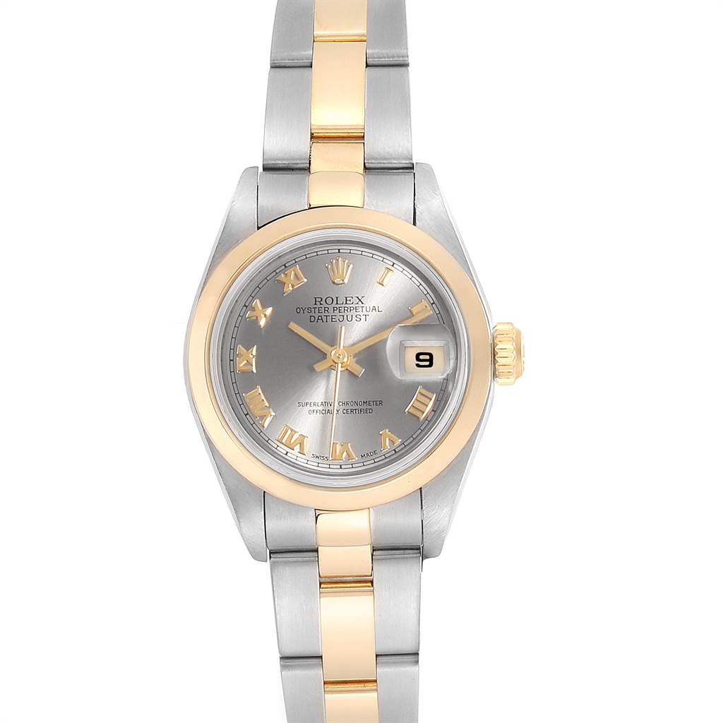 The image shows a Rolex Datejust 79163 Women's Steel and Gold (two tone) Grey Dial 79163 Women's Steel and Gold (two tone) Grey Dial watch, featuring a gold and silver bracelet, and a silver dial with a date display at 3 o'clock.
