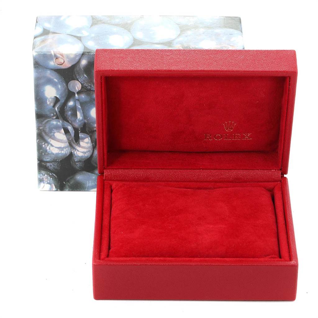 The image shows a red Rolex watch box for a Datejust model, open with red velvet lining inside.