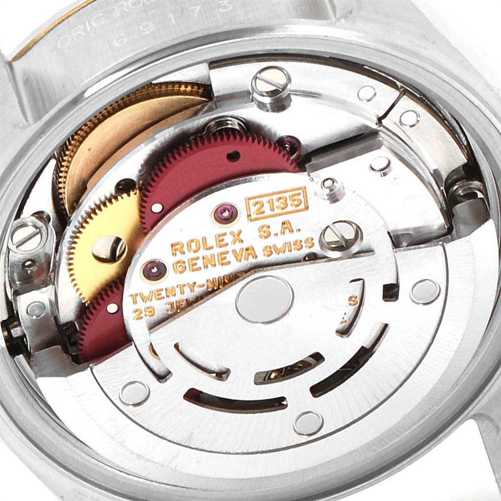 This image shows the intricate internal mechanism of the Rolex Datejust 69173 Women's Stainless Steel Champagne Dial 69173 Women's Stainless Steel Champagne Dial watch, highlighting its gears and components.