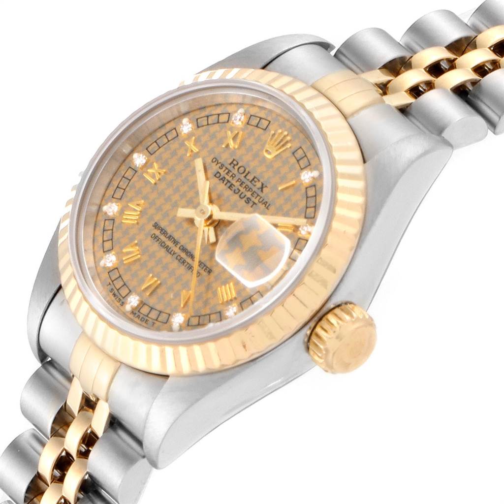 The image shows a close-up view of a Rolex Datejust 69173 Women's Stainless Steel Champagne Dial 69173 Women's Stainless Steel Champagne Dial watch, highlighting the dial, crown, and a part of the bracelet.