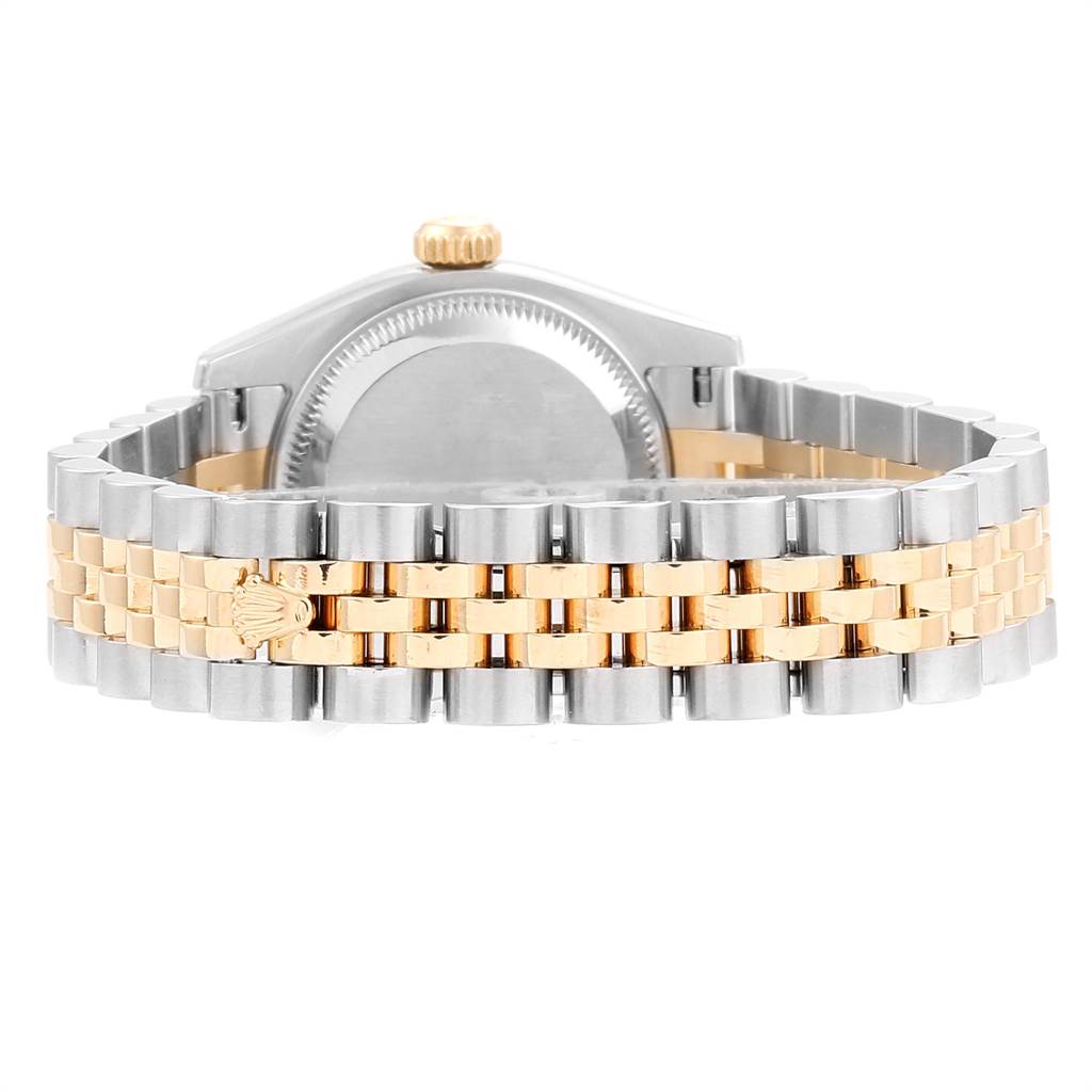 The image shows the back of a Rolex Datejust 179173 Women
s Steel and Gold (two tone) Red Dial 179173 Women
s Steel and Gold (two tone) Red Dial watch and its two-tone Jubilee bracelet with a clasp.