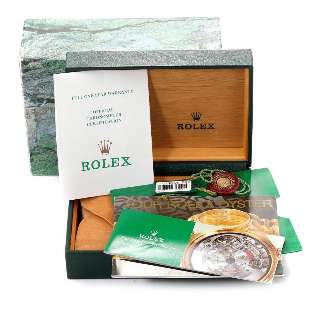 The image shows the packaging, warranty booklet, and accessories for a Rolex Datejust 69163 Women's Stainless Steel White Dial 69163 Women's Stainless Steel White Dial watch.