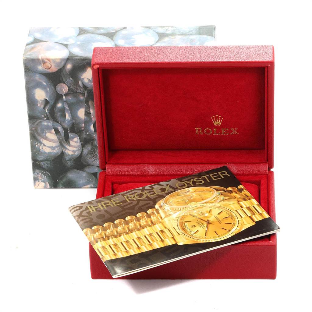 The image shows a red Rolex watch box and a pamphlet featuring the Rolex Datejust 69173 Women's Stainless Steel Silver Dial 69173 Women's Stainless Steel Silver Dial model.