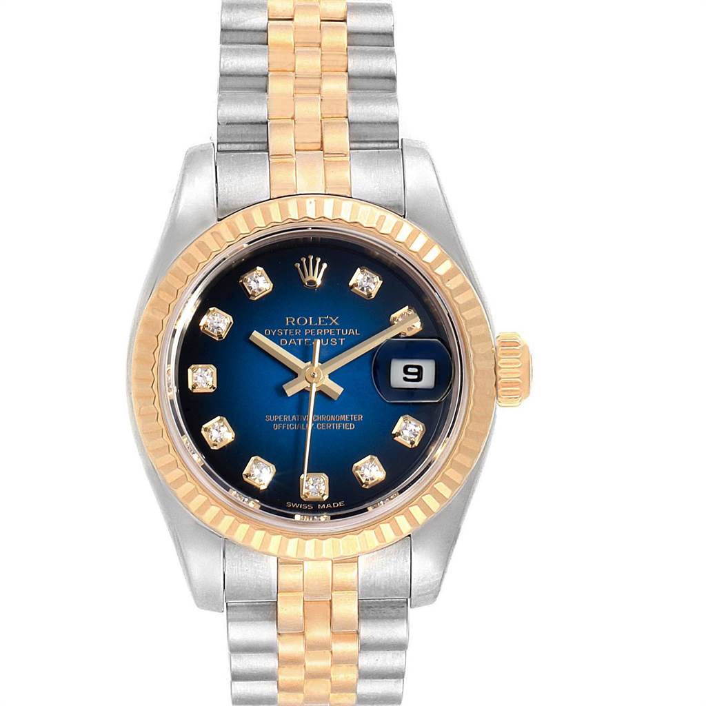 The Rolex Datejust 179173 Women
s Steel and Gold (two tone) Blue Dial 179173 Women
s Steel and Gold (two tone) Blue Dial watch is shown from a frontal view, highlighting its blue dial, diamond hour markers, and two-tone metal bracelet.